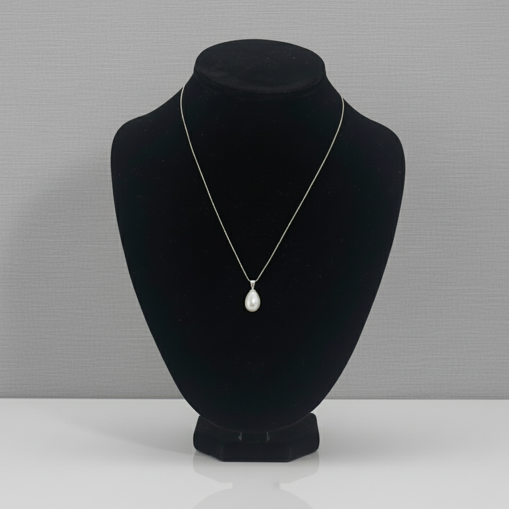 Single rice pearl necklace with a silver chain