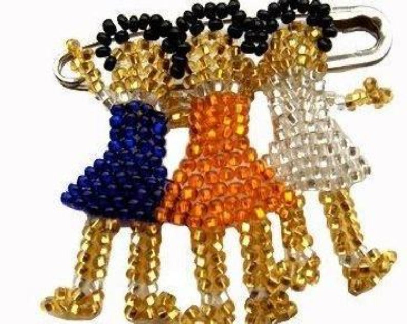 Help Lesotho brooch made by HIV-positive woman