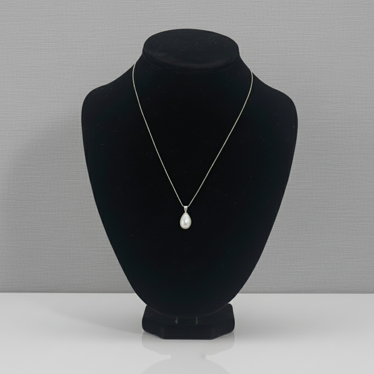 Single rice pearl necklace with a silver chain